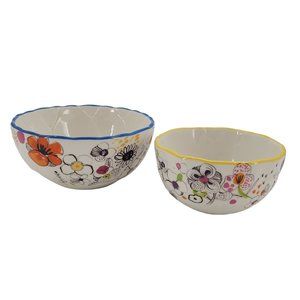Tag bowls with colorful flowers, butterfly and bee